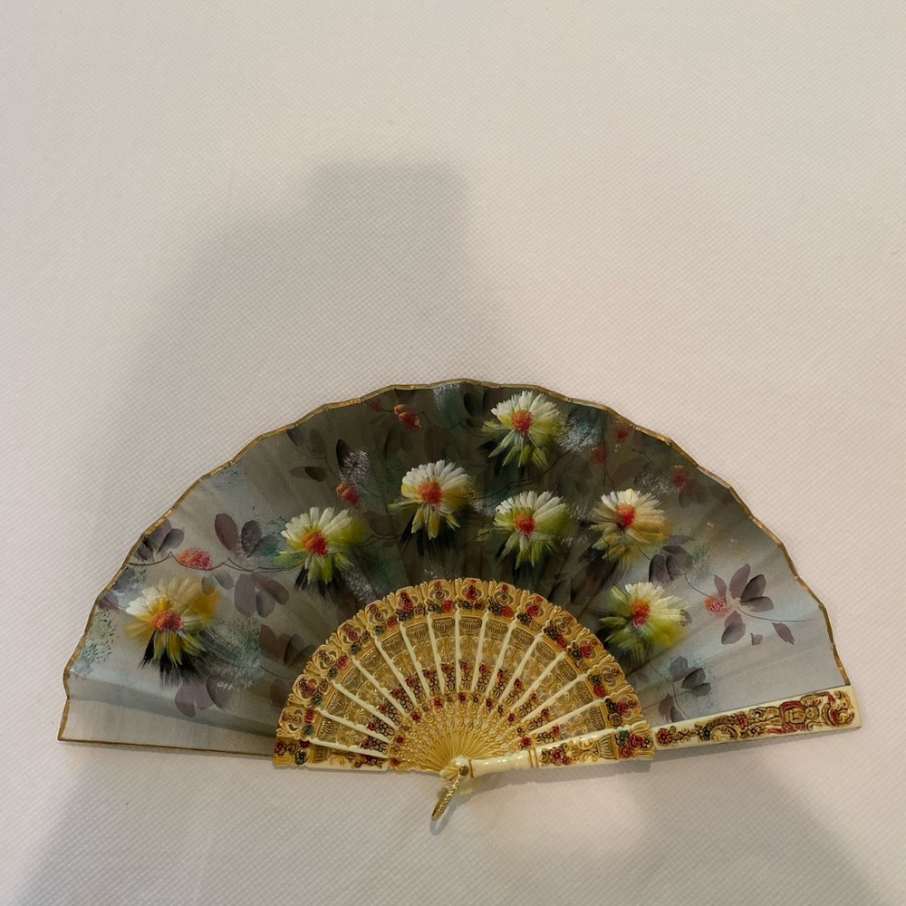 Pretty painted fan.